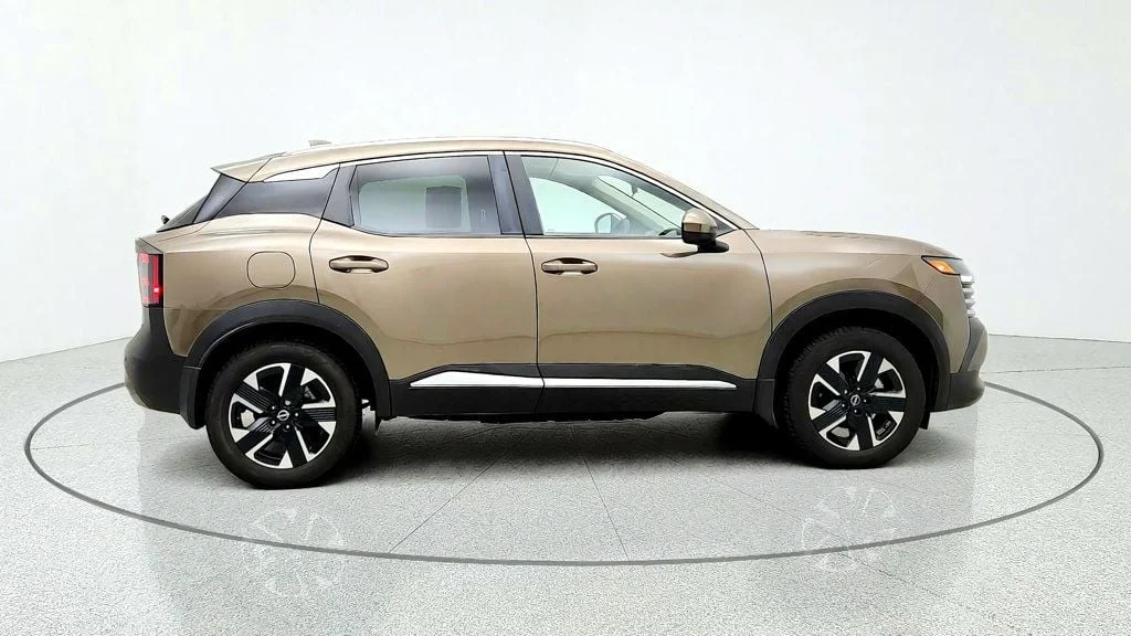 Used 2025 Canyon Bronze Metallic Nissan SV AWD image 4