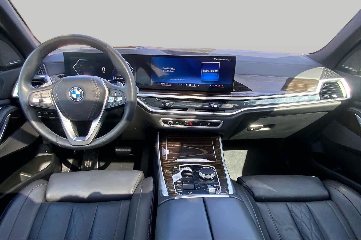 Used 2025 Black Sapphire Metallic BMW xDrive50e image 16