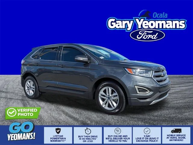 Used 2016 Magnetic Metallic Ford SEL image 1