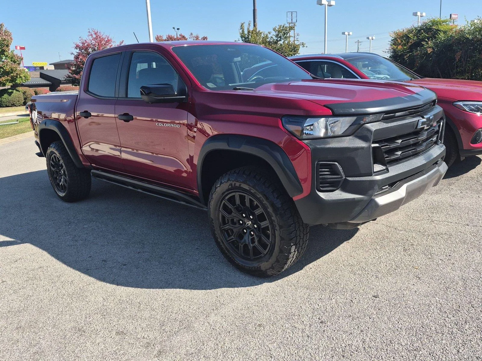 Used 2023 Radiant Red Tintcoat Chevrolet 4WD Trail Boss image 6