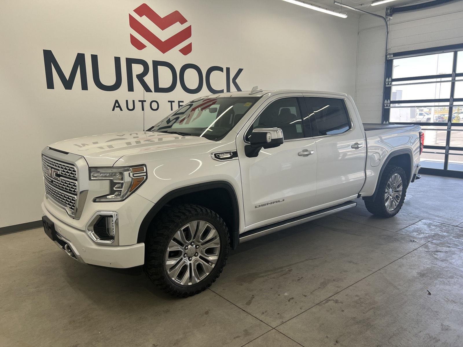 Used 2021 White Frost Tricoat GMC Denali image 1