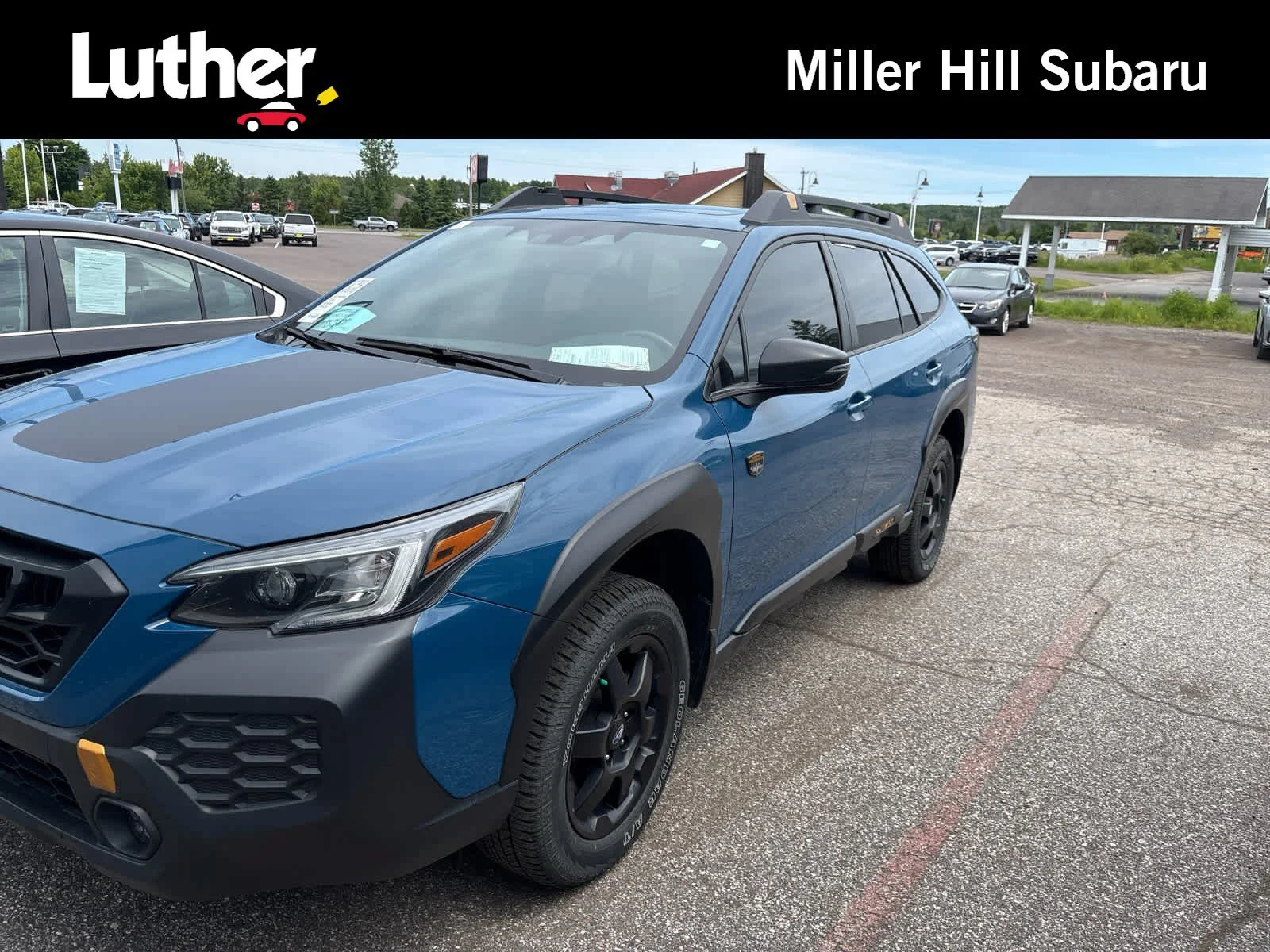 Used 2024 Geyser Blue Subaru Wilderness image 1