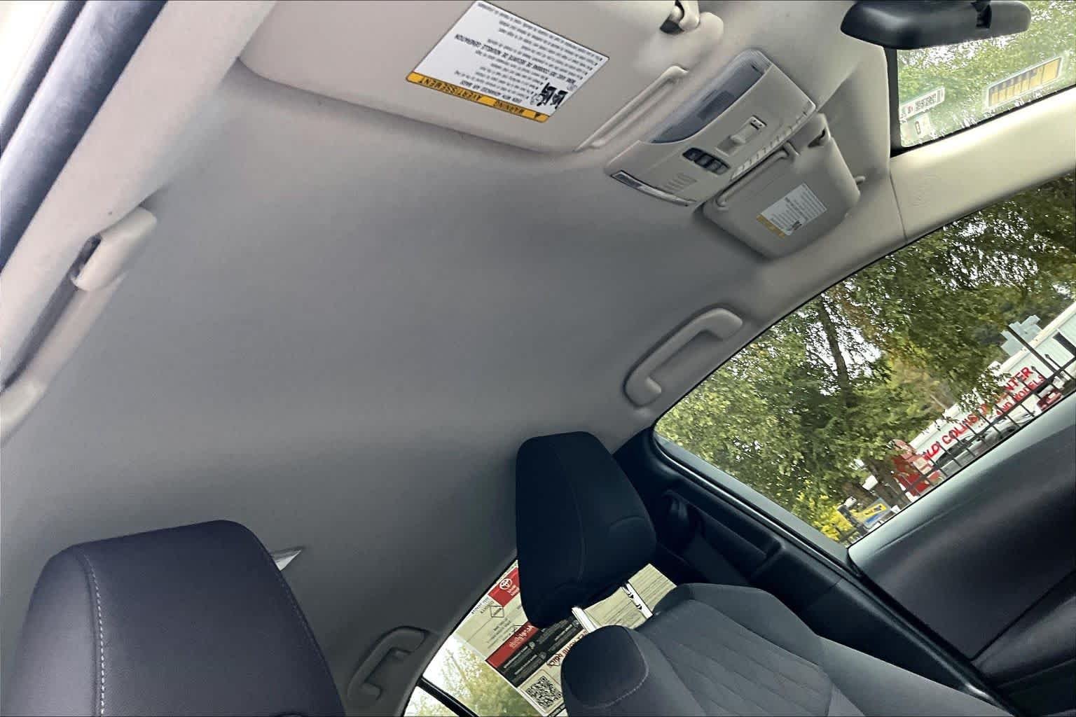 Used 2021 Super White Toyota LE image 14