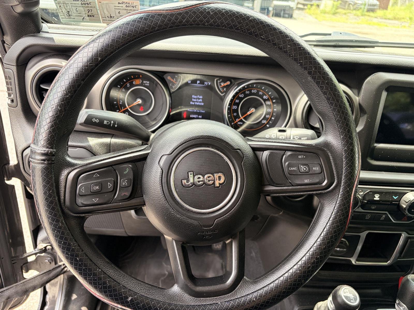 Used 2022 Granite Crystal Metallic Clearcoat Jeep Unlimited Sport image 11