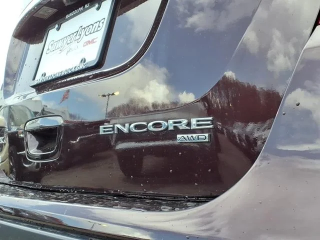 Certified Used 2018 Includes (CM5) Black Carbon Metallic lower exterior accent color, Paint code W700S. Buick Preferred image 7