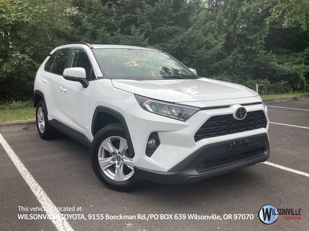 Used 2021 White Toyota XLE image 1