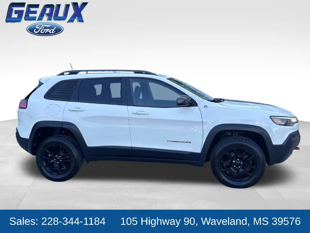 Used 2019 Pearl White Pearlcoat Jeep Trailhawk image 1
