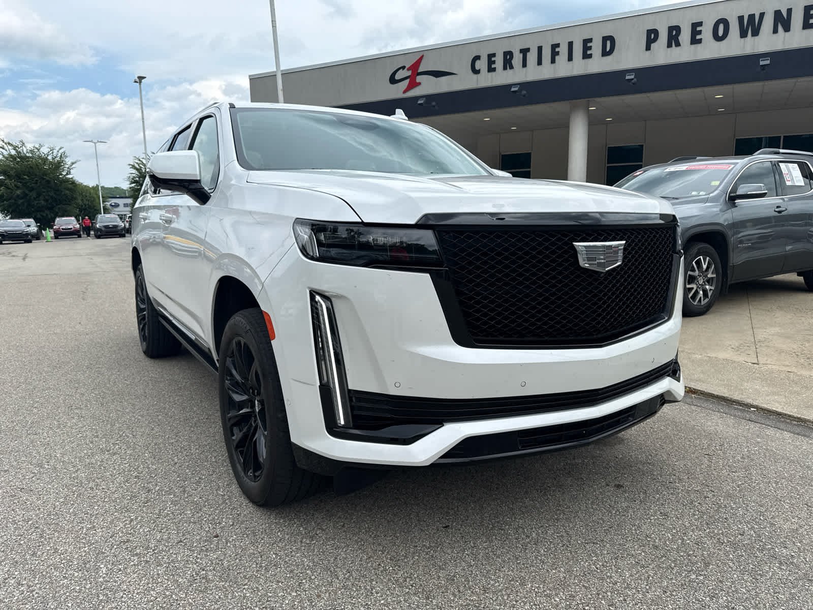 Used 2023 Crystal White Tricoat Cadillac Sport Platinum image 1