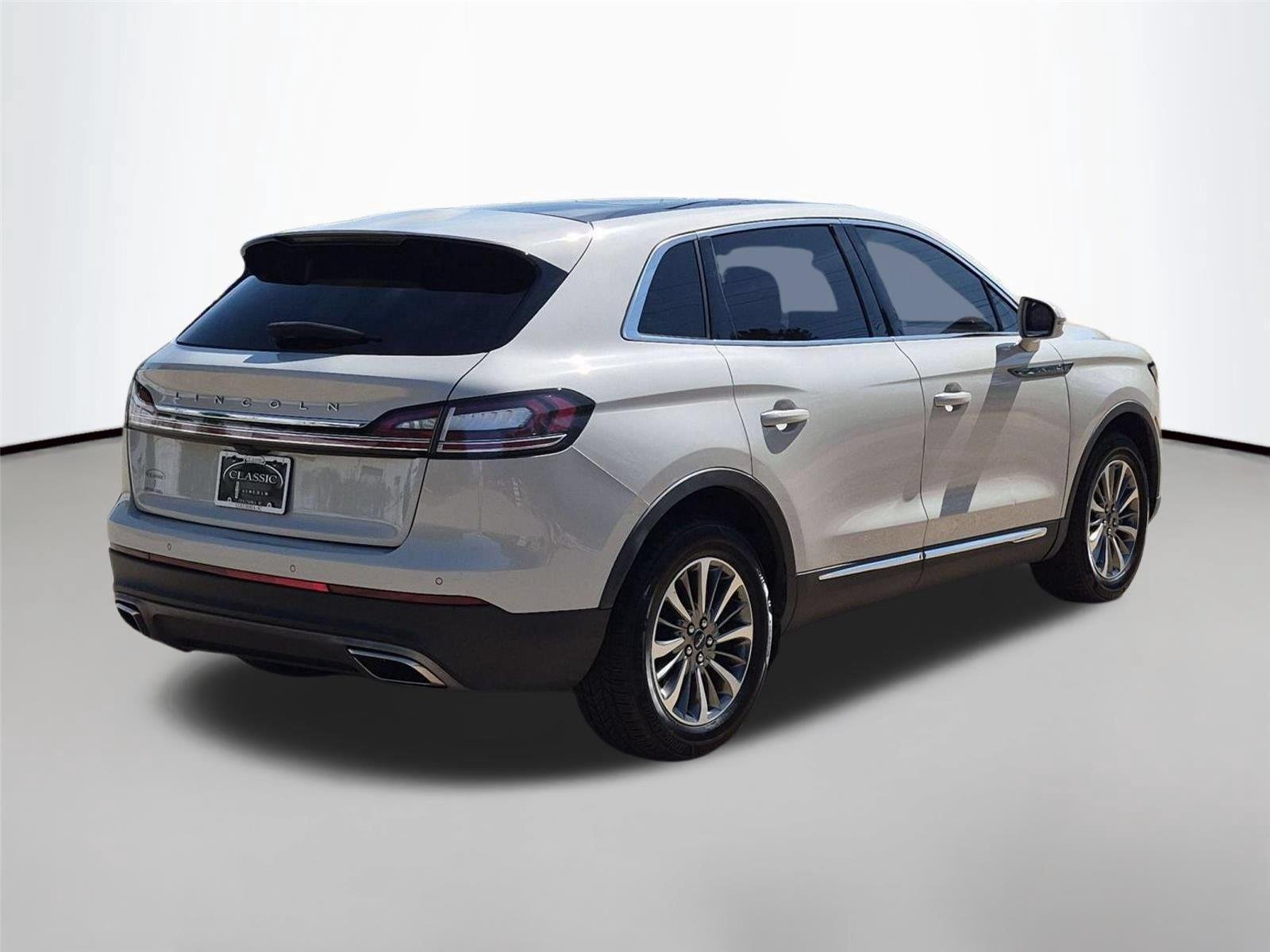 Used 2022 Ceramic Pearl Metallic Tinted Clearcoat Lincoln Reserve image 5