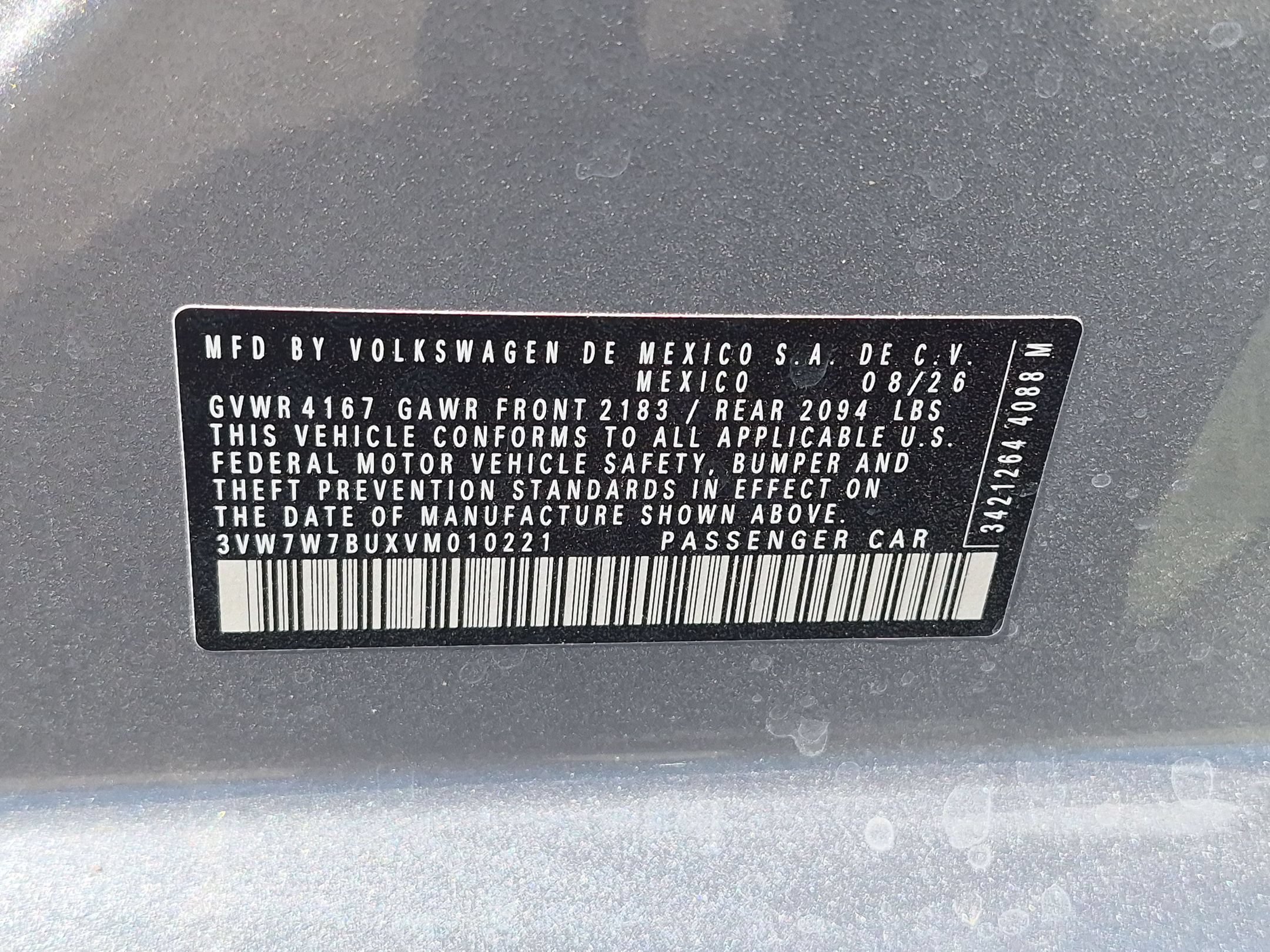 New 2027 Pyrite Silver Metallic Volkswagen SE image 16