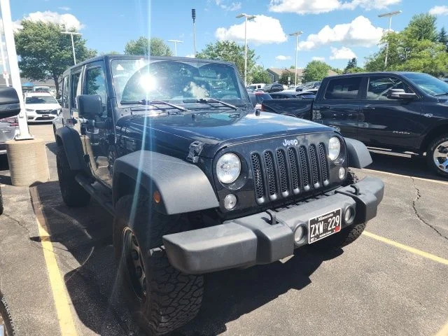 Used 2017 Black Jeep Unlimited Sport image 1