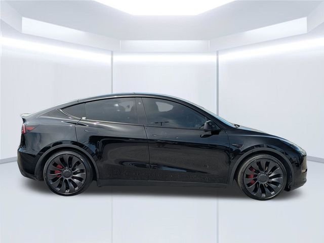 Used 2023 Solid Black Tesla Performance image 7