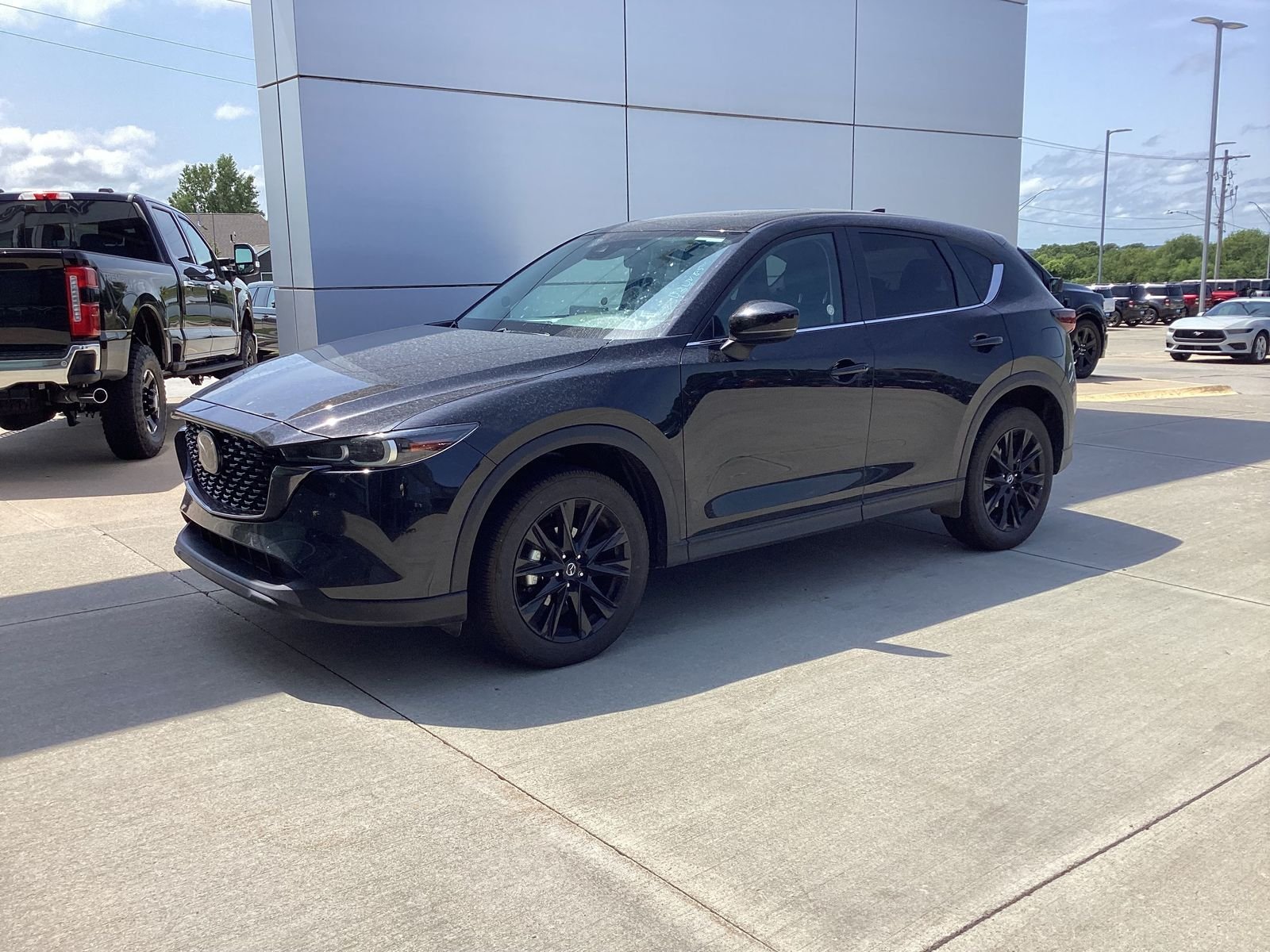 Certified Used 2025 Jet Black Mica Mazda 2.5 S Carbon Edition image 1