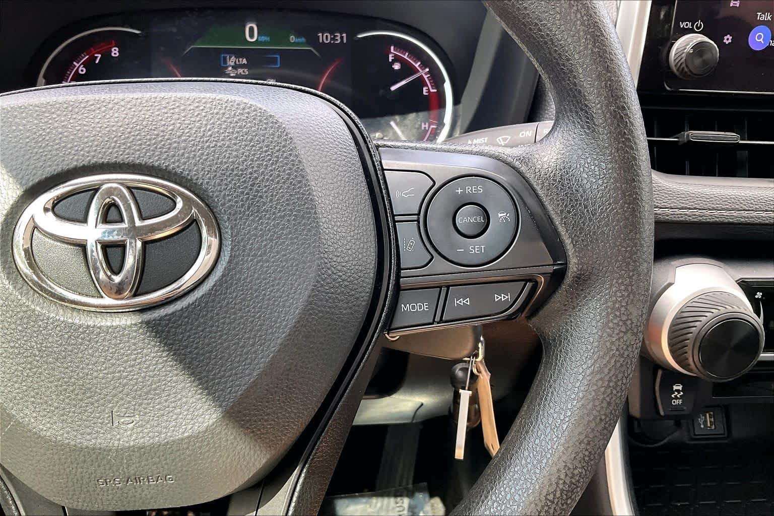 Used 2025 Magnetic Gray Metallic Toyota LE image 19