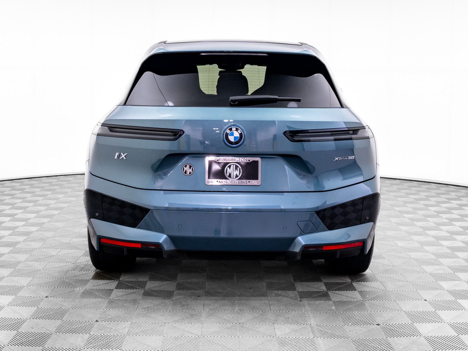Used 2024 Blue BMW xDrive50 image 4