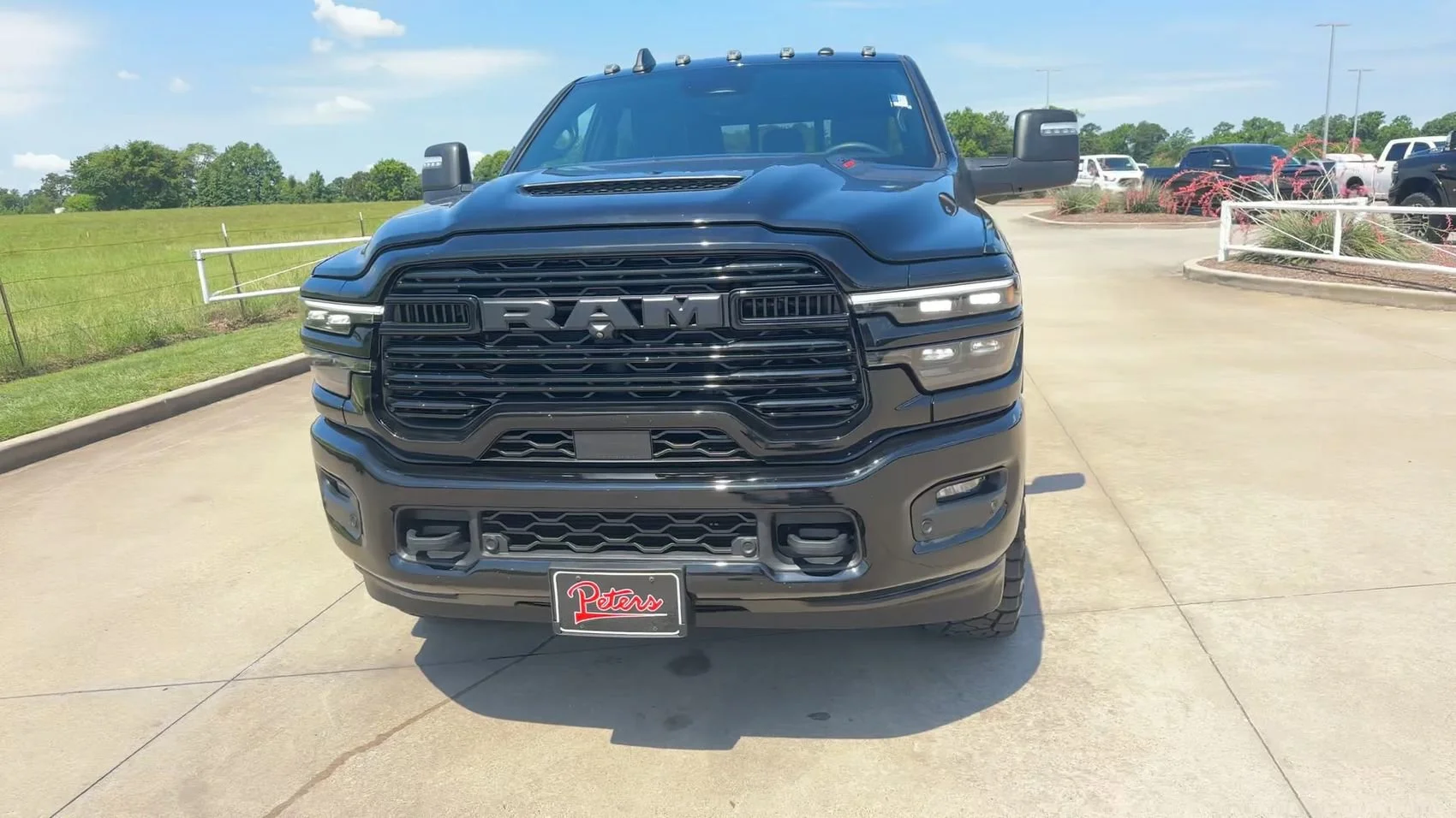 Used 2025 Diamond Black Crystal Pearlcoat Ram Laramie image 2