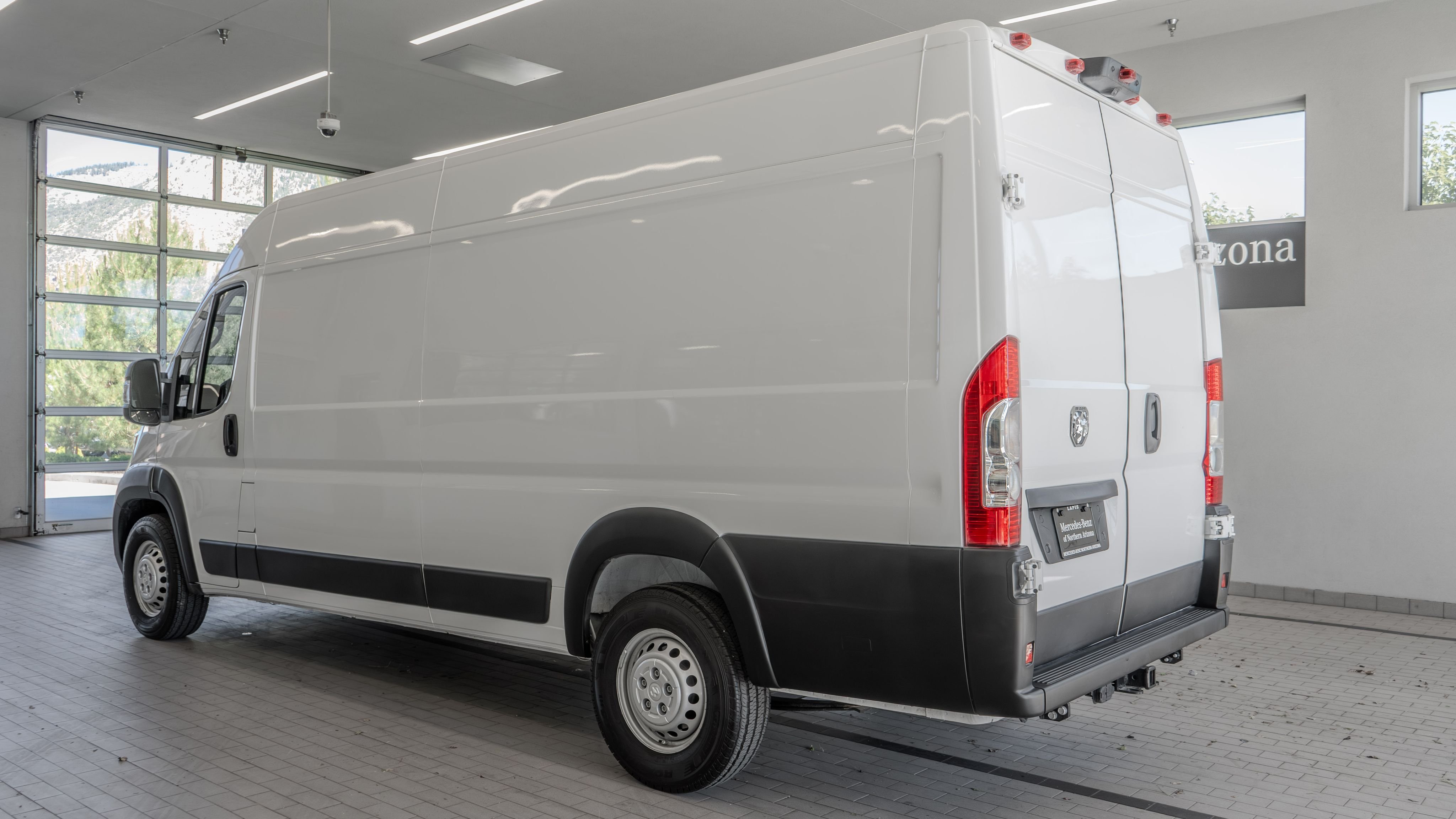 Used 2024 Bright White Clearcoat Ram High Roof image 13