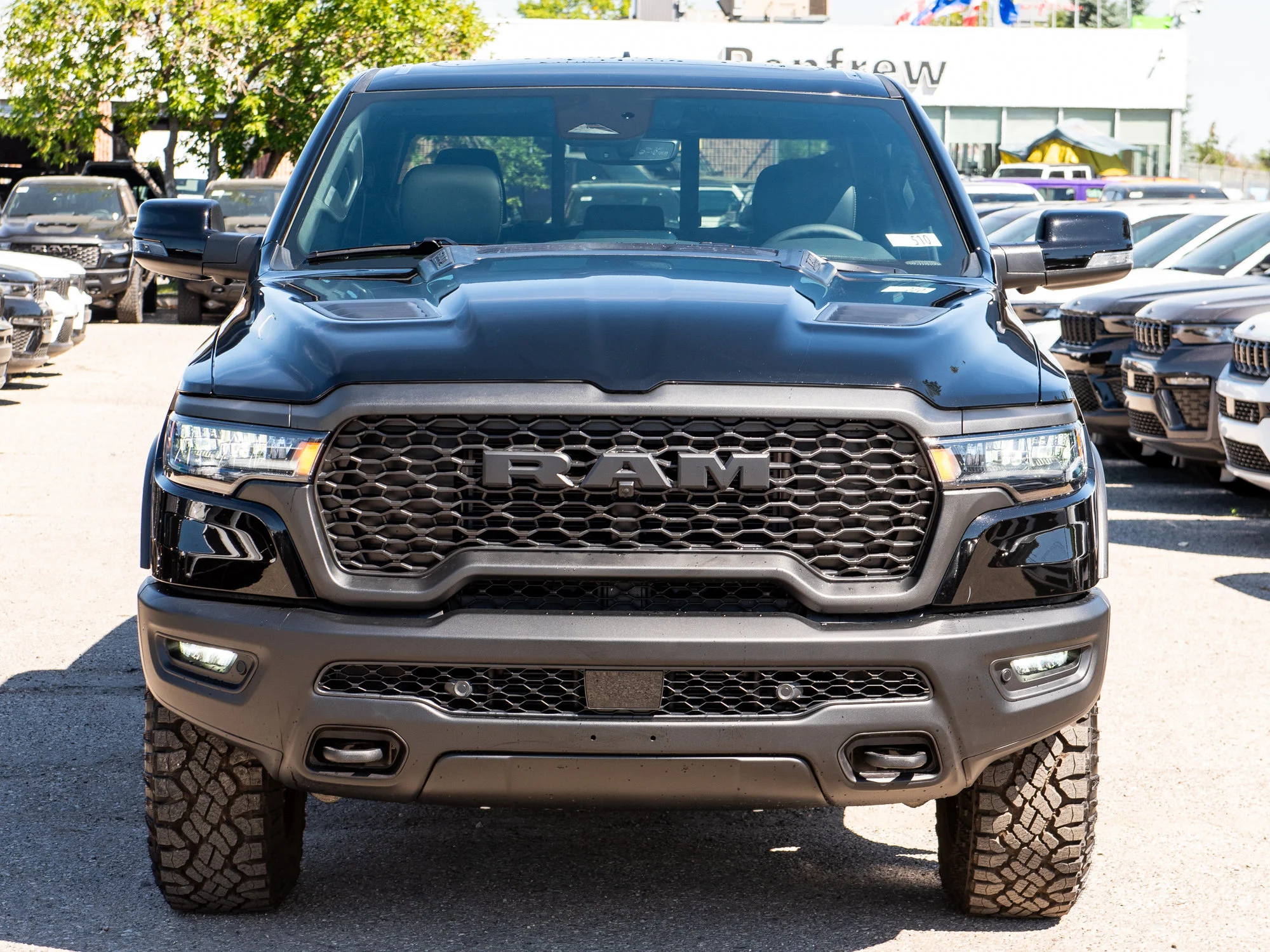 New 2026 Black RAM Rebel* Crew Cab 4x4, 33 Inch A/T Tires, Pano Sunroof, Passenger Screen image 11