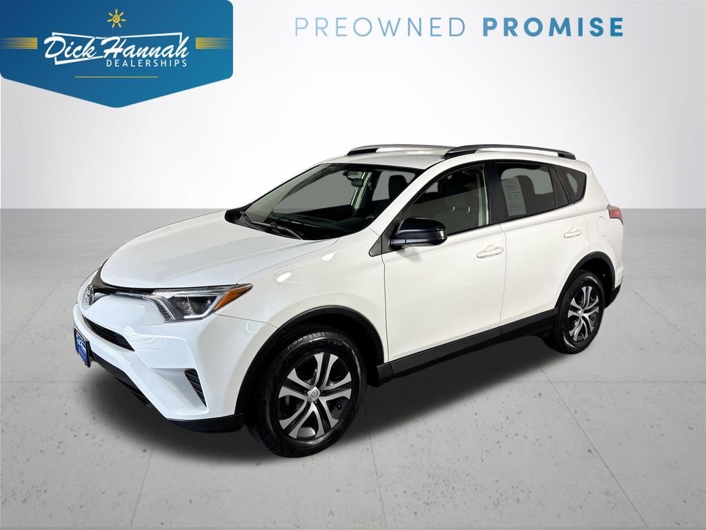 Used 2016 Super White Toyota LE image 1