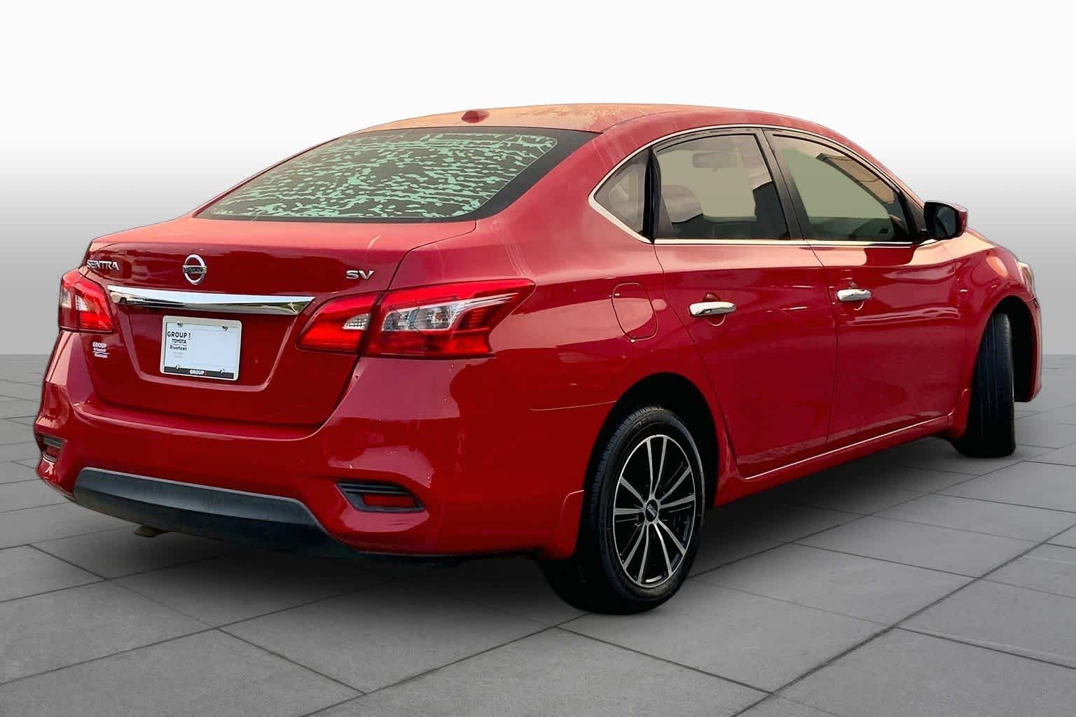 Used 2017 Red Alert Nissan SV image 13