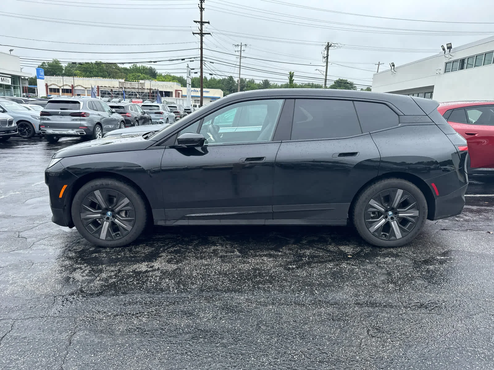Certified Used 2024 Black Sapphire Metallic BMW xDrive50 image 4