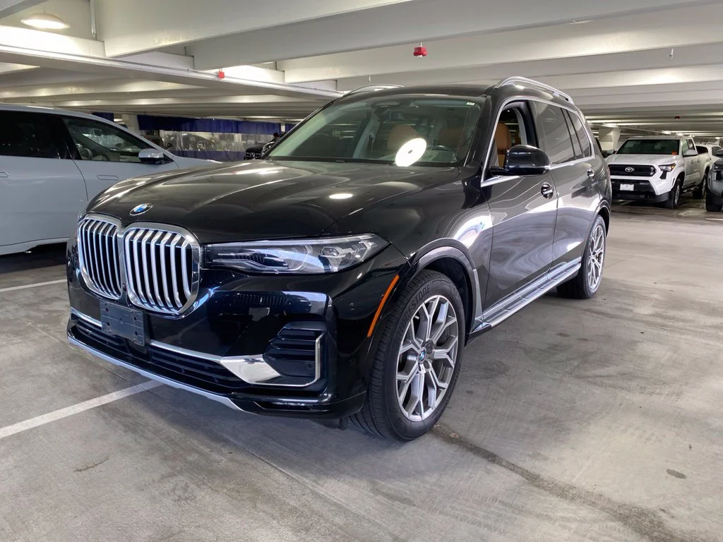 Used 2019 Black Sapphire Metallic BMW xDrive40i image 1