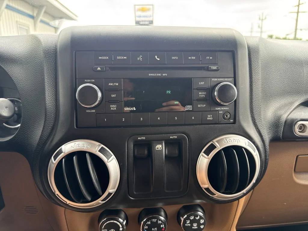 Used 2011 Orange Jeep Rubicon image 30