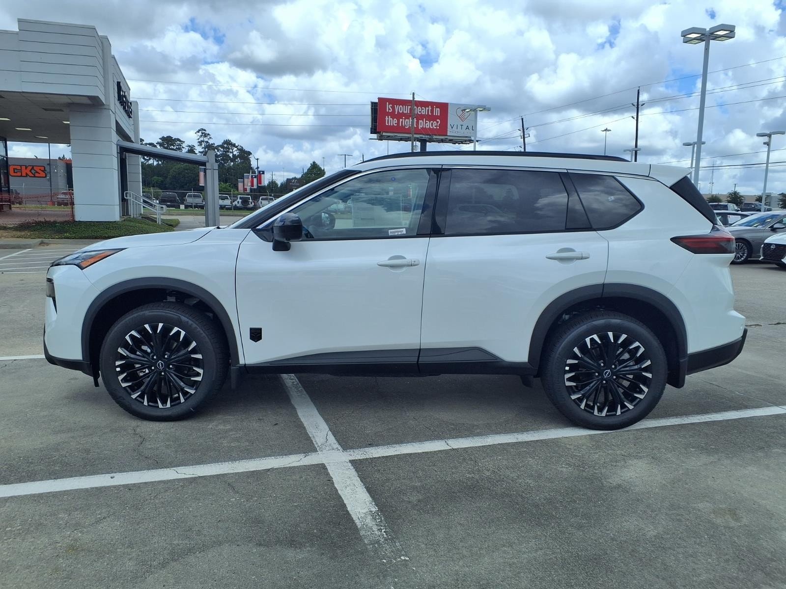 2026 Nissan Rogue Dark Armor™ White at Robbins Nissan