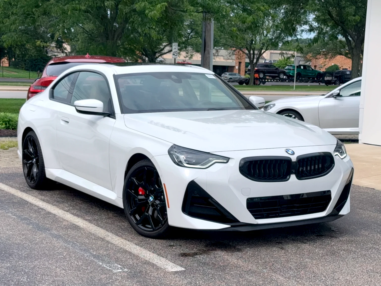 Used 2025 Alpine White BMW 230i xDrive image 1