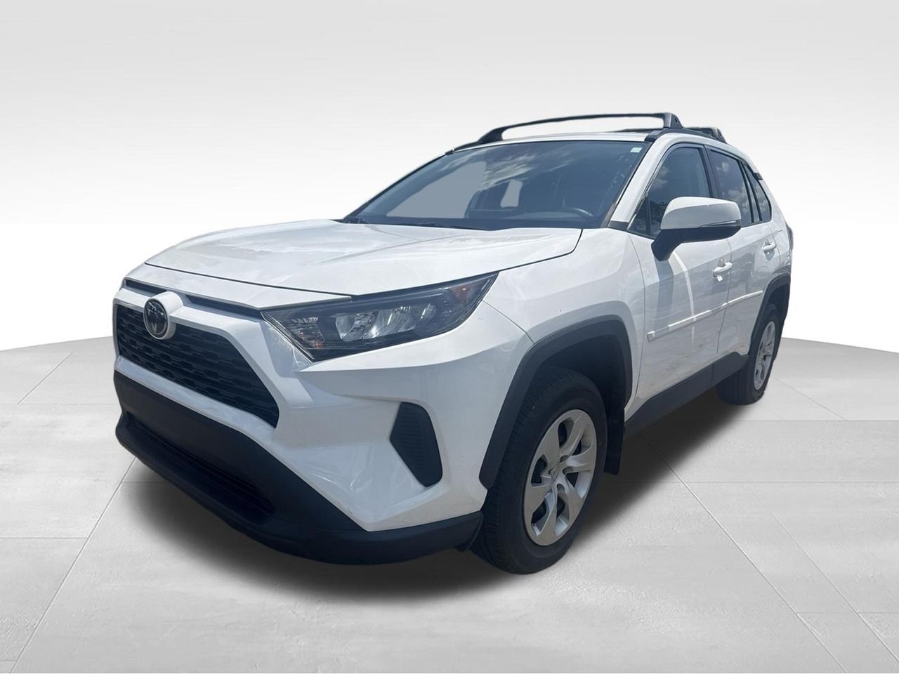 Used 2021 White Toyota LE image 1