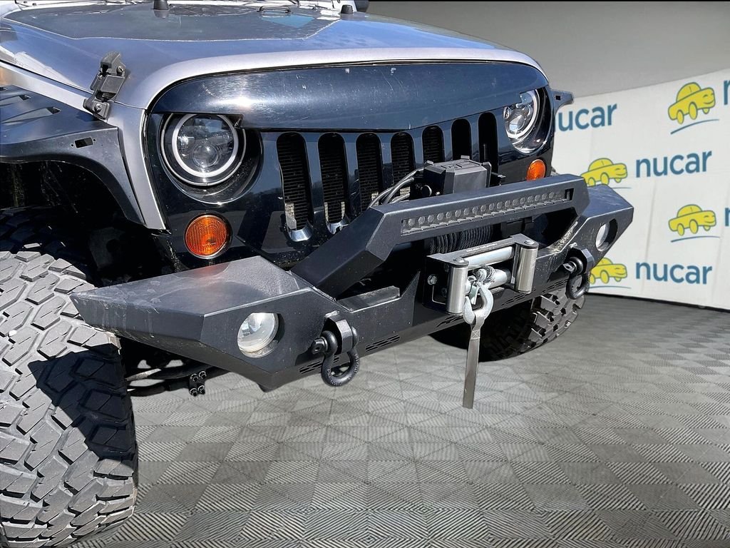 Used 2013 Billet Metallic Clearcoat Jeep Sport image 5