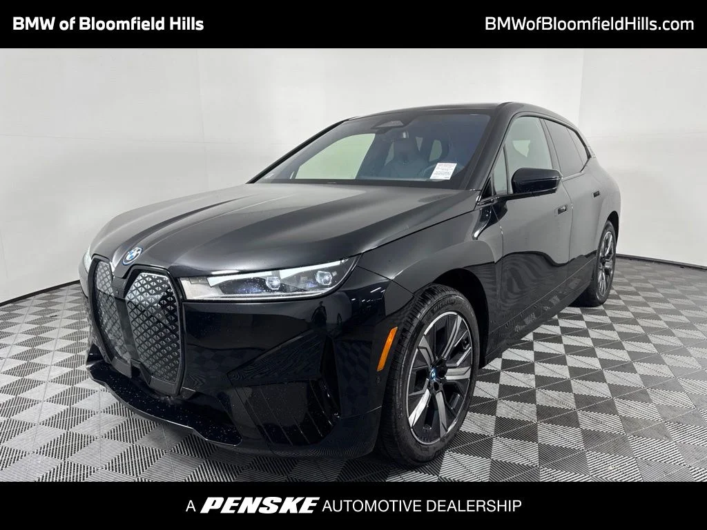 Certified Used 2024 Black BMW xDrive50 image 1