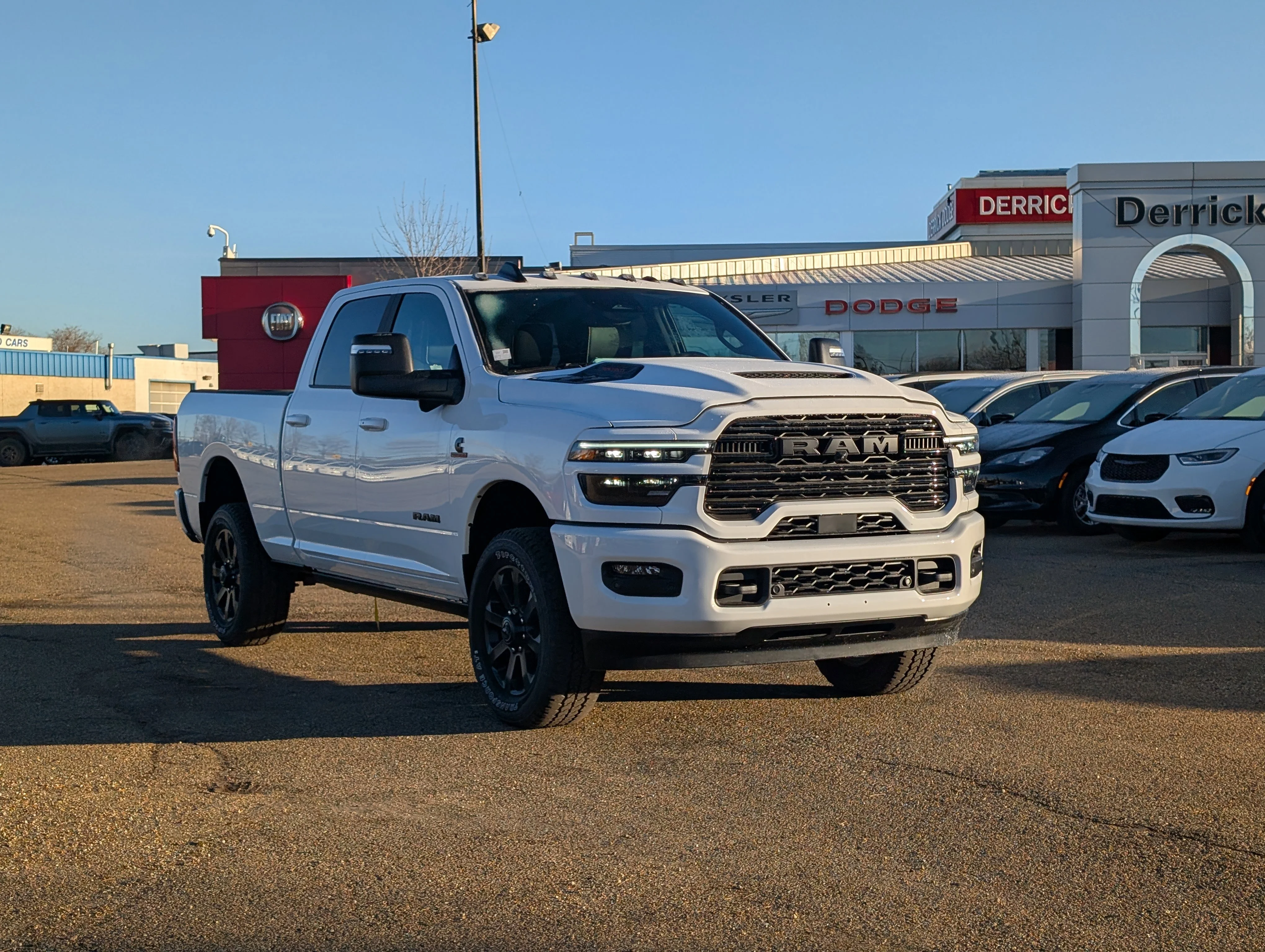 New 2026 Bright White Ram Laramie image 9