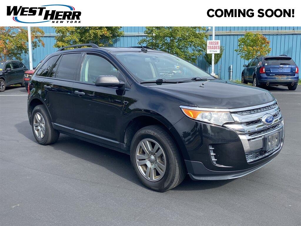 Used 2013 Tuxedo Black Metallic Ford SE image 1