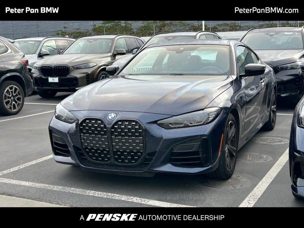 Certified Used 2024 Tanzanite Blue II Metallic BMW M440i xDrive image 1