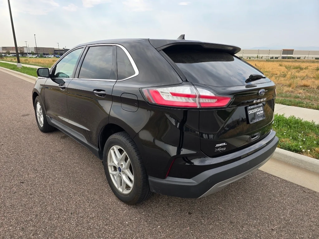Used 2022 Agate Black Metallic Ford SEL image 3