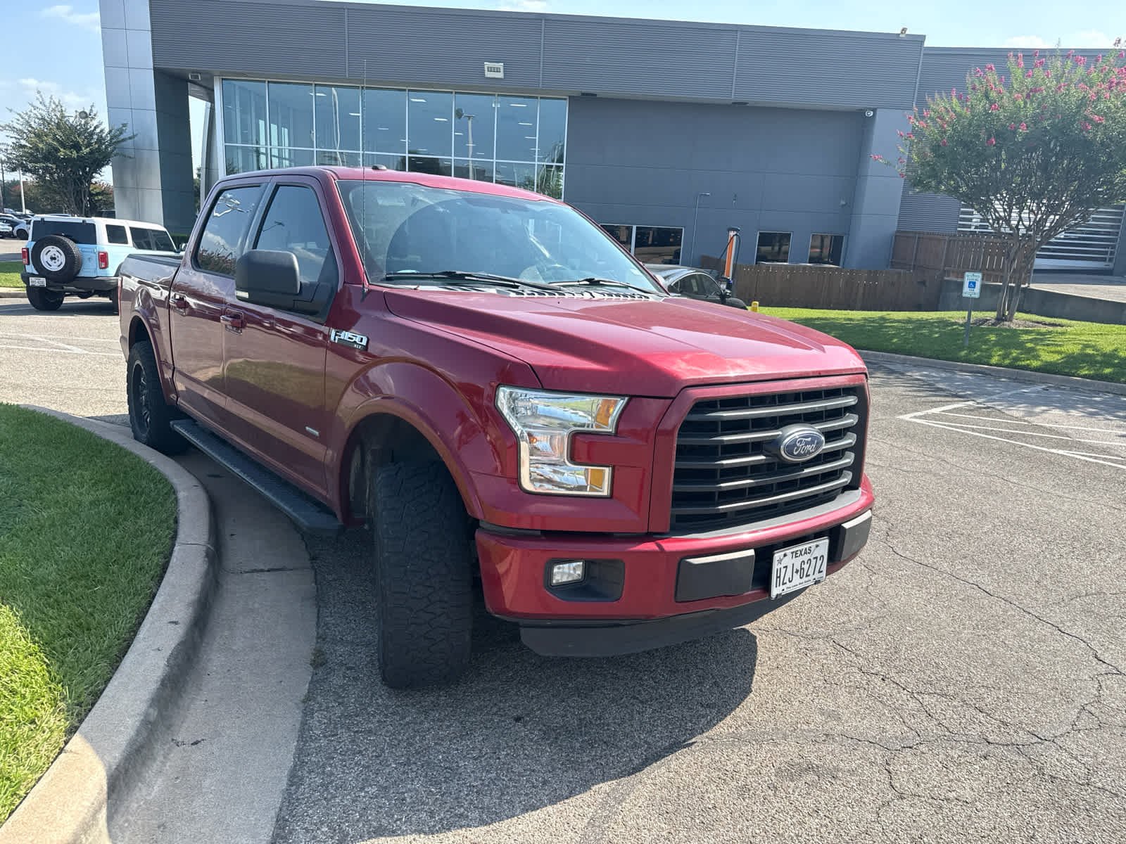 Used 2016 Ruby Red Metallic Tinted Clearcoat Ford XLT image 2