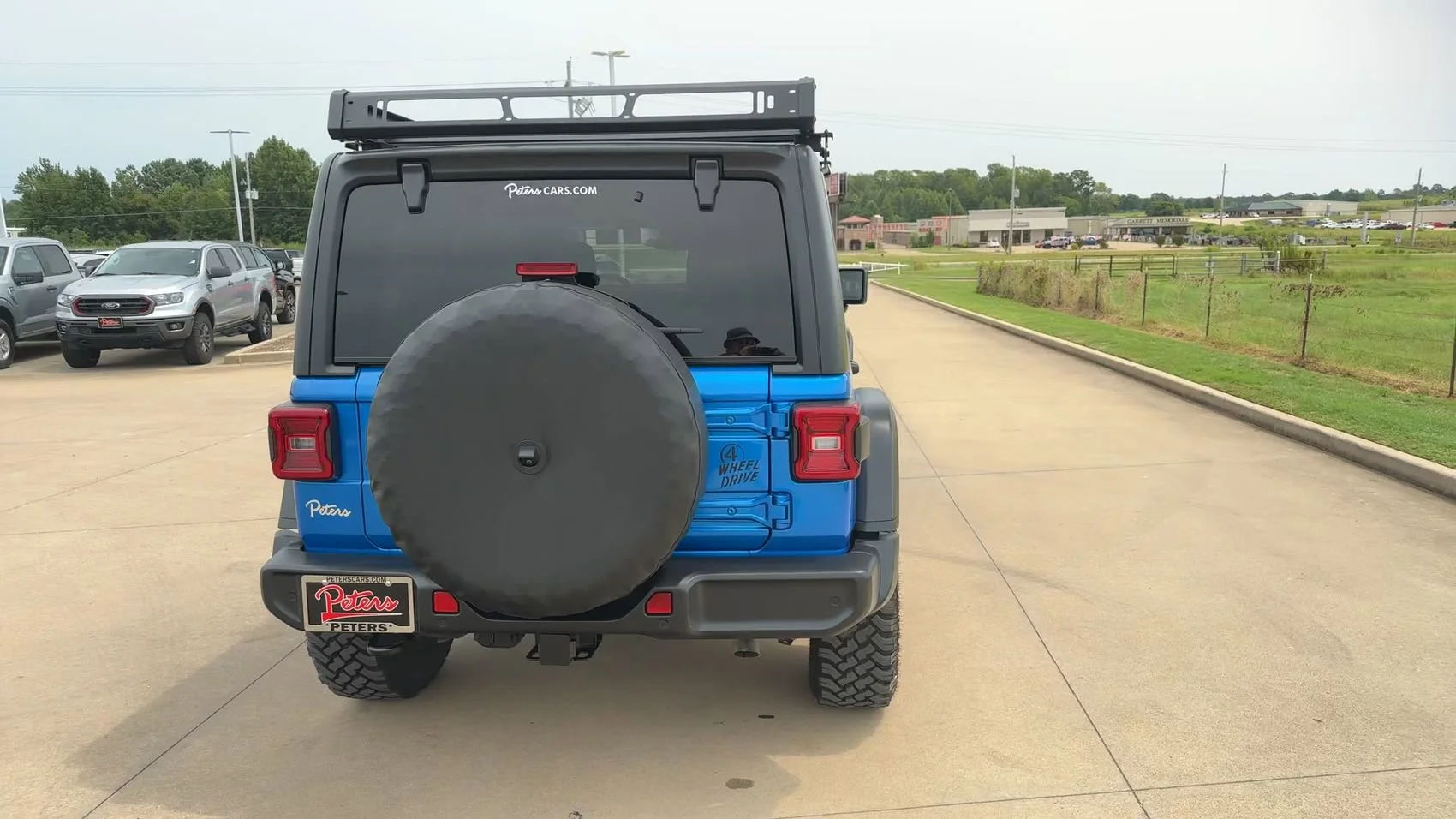 Used 2024 Hydro Blue Pearl Coat Jeep Sport image 8