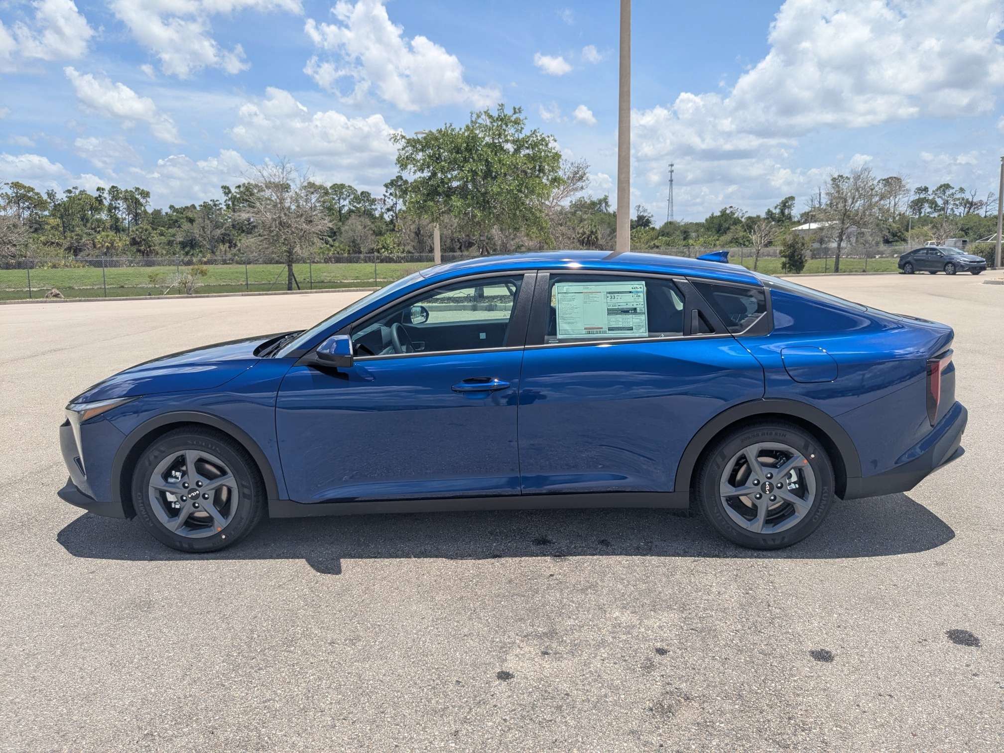 New 2026 Deep Sea Blue Kia LXS image 8
