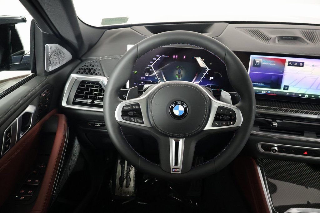 New 2027 Black Sapphire Metallic BMW M60i image 3