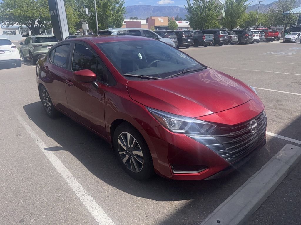 Red 2024 Nissan Versa SV FWD Sedan Front-Wheel Drive