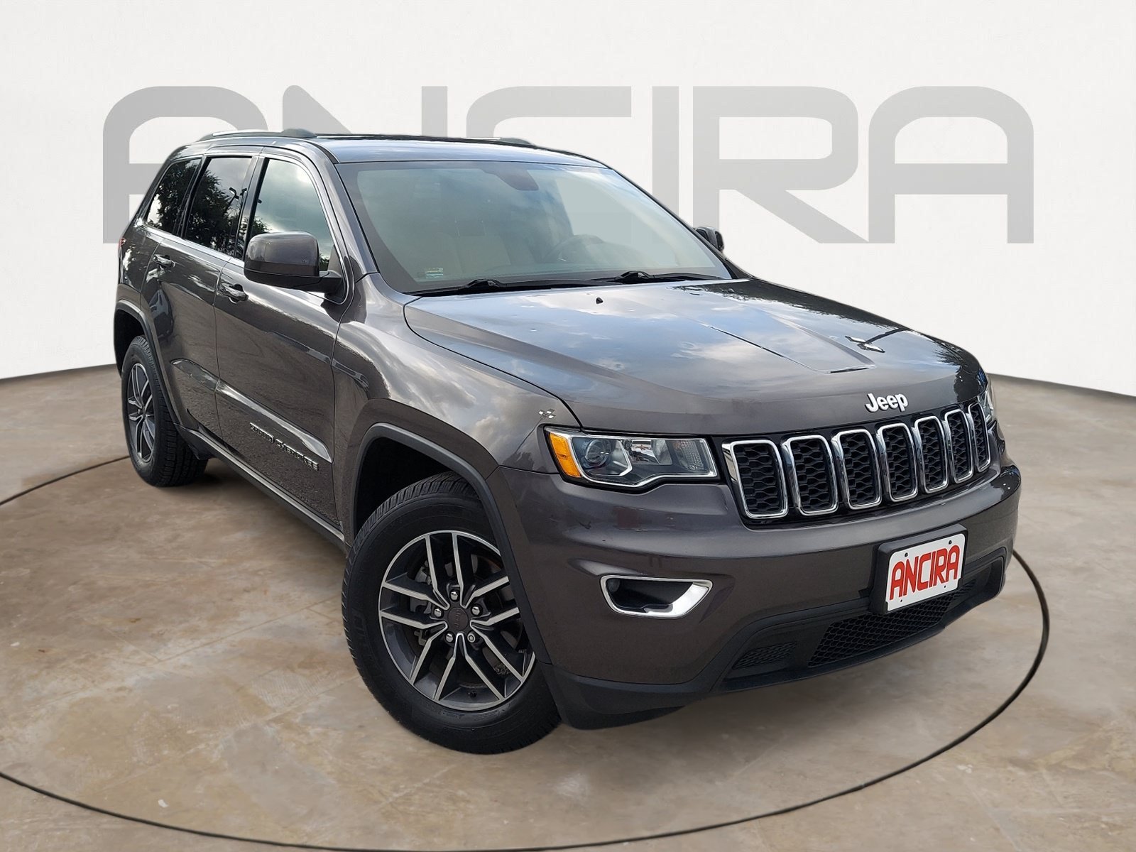 Used 2019 Granite Crystal Metallic Clearcoat Jeep Laredo E image 4