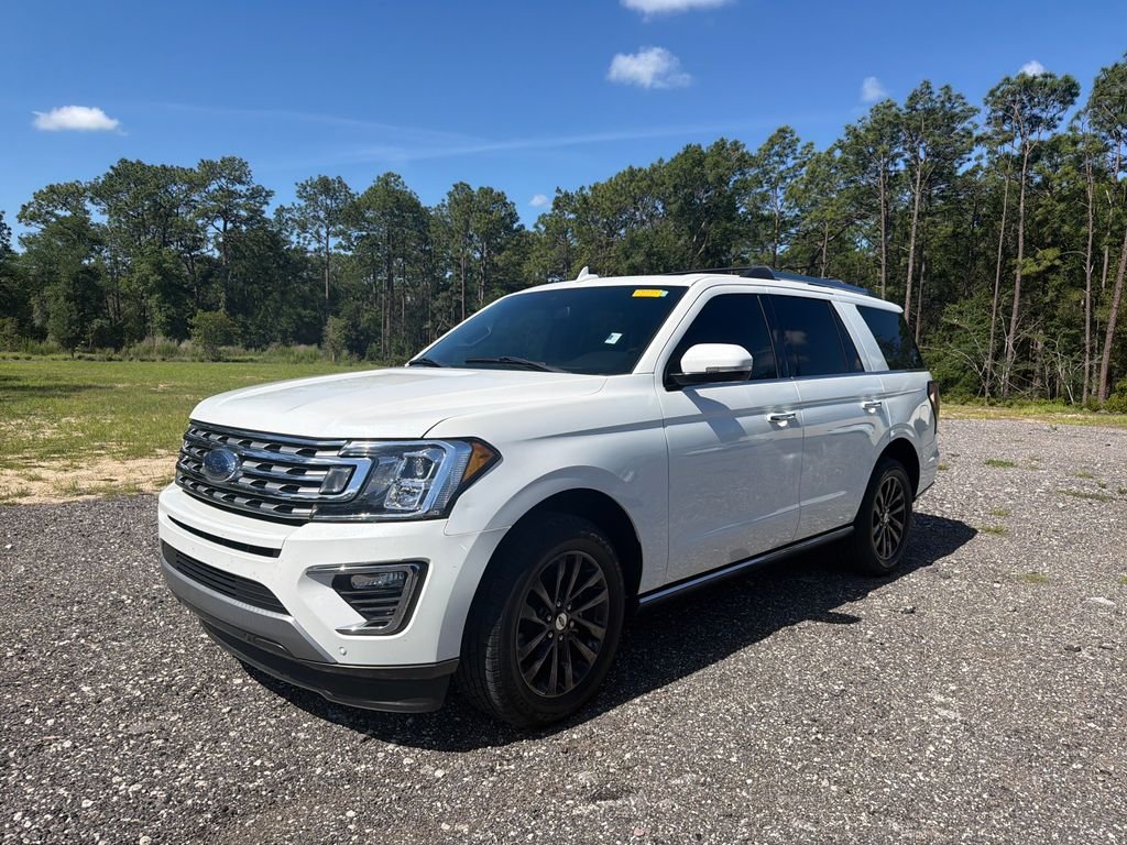 Used 2021 White Metallic Ford Limited image 1