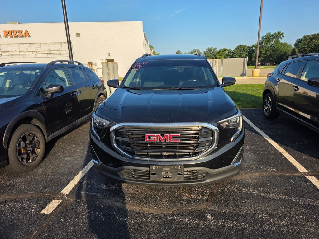 Used 2018 Ebony Twilight Metallic GMC SLE image 1