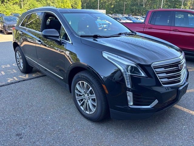 Used 2017 Stellar Black Metallic Cadillac Luxury AWD image 1