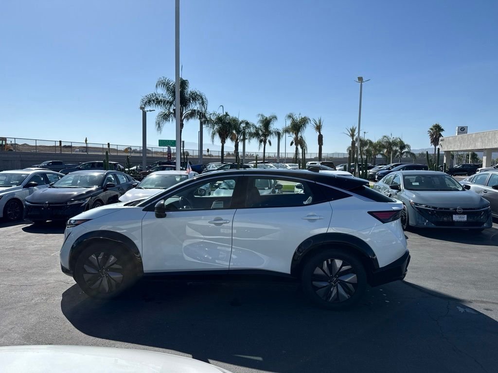 Used 2024 White Nissan EVOLVE+ image 6