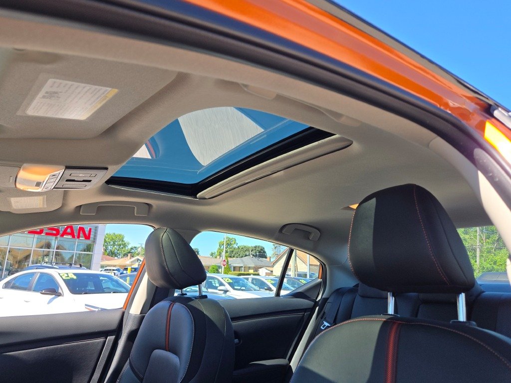 Certified Used 2025 Orange Nissan SR image 23