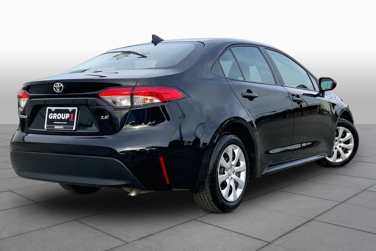 Used 2025 Midnight Black Metallic Toyota LE image 13
