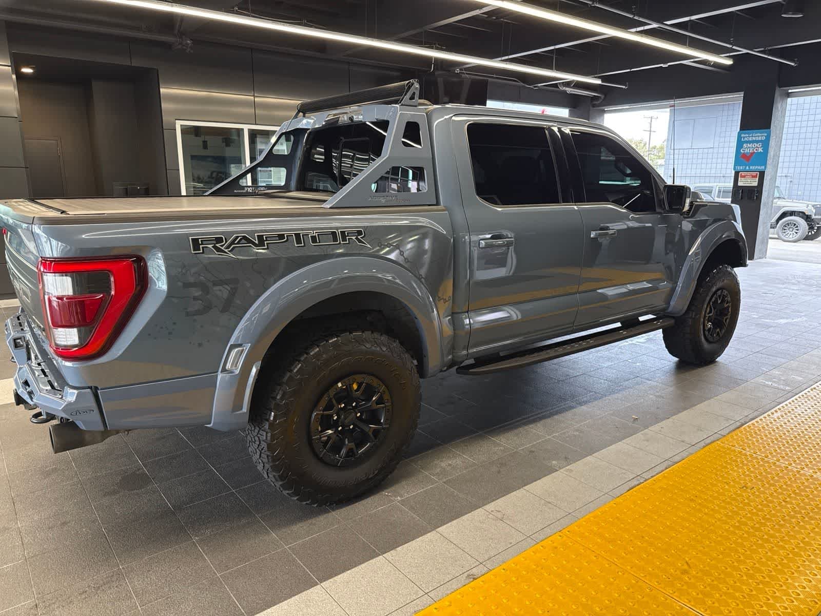 Used 2023 Azure Gray Metallic Tri-Coat Ford Raptor image 11
