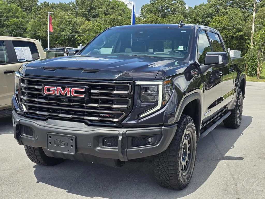 Used 2023 Titanium Rush Metallic GMC AT4X image 3